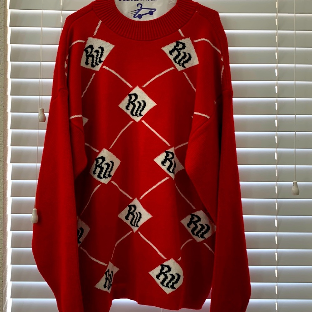 Red and white Men’s crewneck sweater with black Rocawear lettering